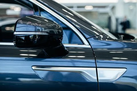 Side view of turning luxury blue car Stock Photos