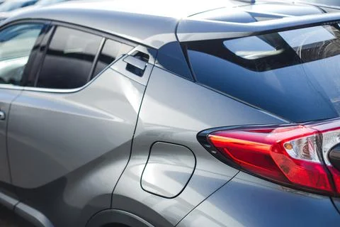 Side view of turning luxury grey car Stock Photos