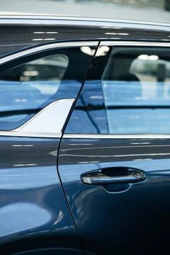 Side view of turning luxury grey car Stock Photos