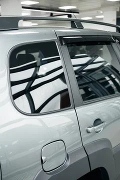 Side view of turning luxury grey car Stock Photos