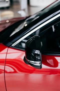 Side view of turning luxury red car Stock Photos