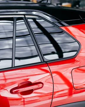 Side view of turning luxury red car Stock Photos