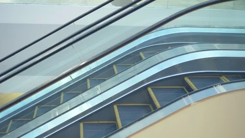 Side view. two empty escalators moving up and down. copy space Stock Footage 125532808