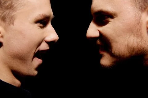 Side view on two screaming men Stock Photos