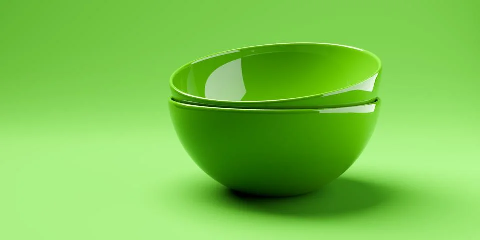 Side view of two stacked empty green ceramic bowls or dishes on green backg.. Stock Illustration