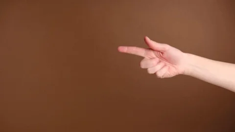 Side view of unrecognizable female makes thumb up gesture, demonstrates approval Video stock 123025148