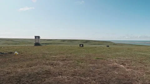 Side view of unrecognizable shooter shooting into target. Gun calibrating before Stock Footage 165904547