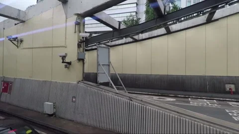 Side View Vehicle Shot, Cross-Harbour Tunnel View from Bus Window, Hong Kong Stock Footage 345642630