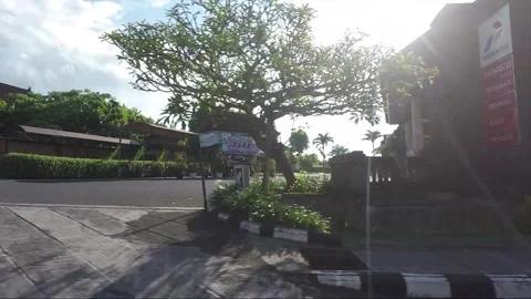Side View, Vehicle Shot, Driving on the road, Bali, Indonesia Видео 252083748