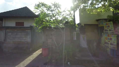 Side View, Vehicle Shot, Driving on the road, Bali, Indonesia Stock Footage 252446746