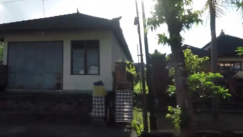 Side View, Vehicle Shot, Driving on the road, Bali, Indonesia Stock Footage 253102129