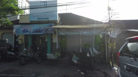 Side View, Vehicle Shot, Driving on the road, Bali, Indonesia Видео 253667030