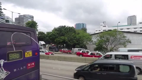 Side View Vehicle Shot, Street View from Bus Window, Driving, Kowloon, Hong Kong Stock Footage 343287355
