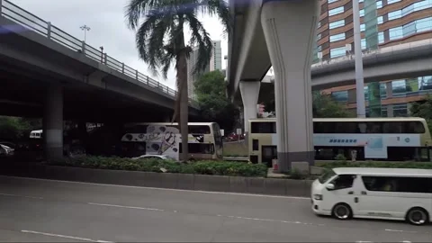 Side View Vehicle Shot, Street View from Bus Window, Driving, Kowloon, Hong Kong Stock Footage 343661741