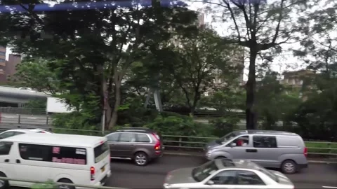 Side View Vehicle Shot, Street View from Bus Window, Driving, Kowloon, Hong Kong Stock Footage 343661983
