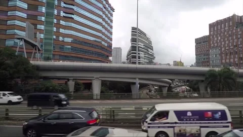 Side View Vehicle Shot, Street View from Bus Window, Driving, Kowloon, Hong Kong Stock Footage 343662732