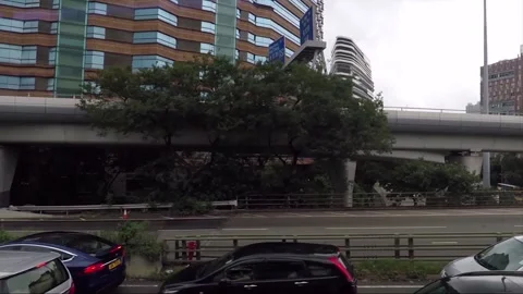 Side View Vehicle Shot, Street View from Bus Window, Driving, Kowloon, Hong Kong Stock Footage 343662745