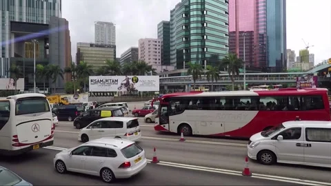 Side View Vehicle Shot, Street View from Bus Window, Driving, Kowloon, Hong Kong Stock Footage 345264589