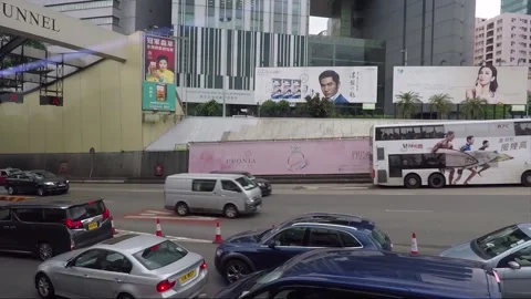 Side View Vehicle Shot, Street View from Bus Window, Driving, Kowloon, Hong Kong Stock Footage 345265877