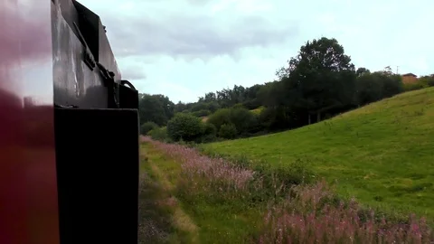 Side view vintage classic steam train in countryside Stock Footage 80303679