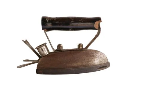 Side view of a vintage old rusty iron isolated in white background Stock Photos