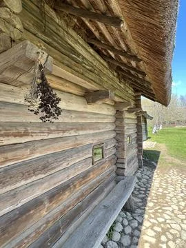 Side view of the wall of a log peasant house Stock Photos