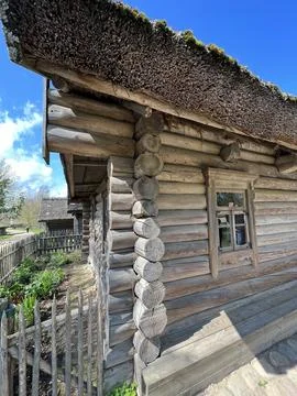 Side view of the wall of a log peasant house Stock Photos