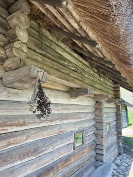Side view of the wall of a log peasant house Stock Photos