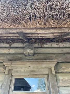 Side view of the wall of a log peasant house Stock Photos