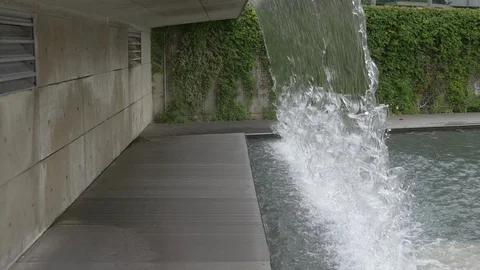 Side view of a waterfall in a park 4K Stock Footage 95432310