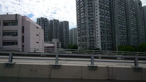 Side view while riding on bus along Kwun Tong Bypass in the morning PartBD Stock Footage 228049789