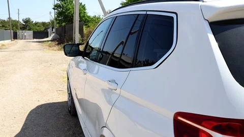 Side view of a white car, body work, transport, service station, auto repair Video stock 315507630