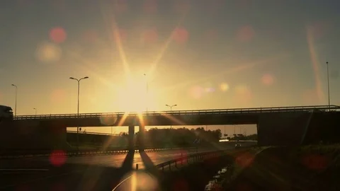 Side-View of a White Semi Truck with Cargo Trailer Driving Across a Bridge.  Stock Footage 78750384