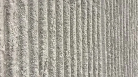 Side View of Off White Stone Wall with Vertical Stripe Texture Background Stock Footage 331061651