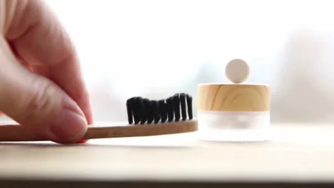 Side view of white toothpaste tablets with fluoride. Video stock 149042481