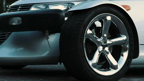 Side view of a white unusual car and a stylish wheel Video stock 139550968