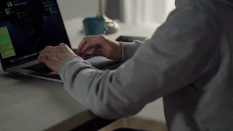 Side view at white young guy works on laptop at home 库存影片 127414335