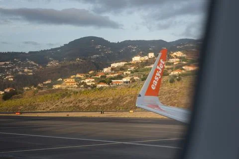 Side view of the wing on EasyJet plane. Funchal Airport. Madeira, Portugal Stock Photos