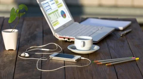 Side view of working Place on natural wooden Table Outdoor Stock Photos