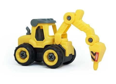 Side view of yellow plastic tractor drill toy isolated on white background... Stock Photos