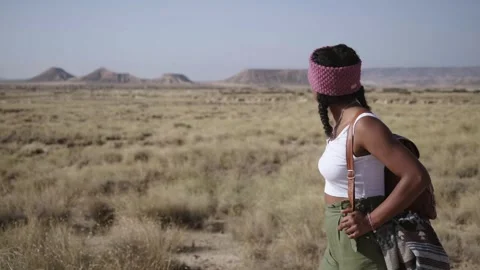 Side view of young American relaxed female backpacker hiker enjoying hot sunny Stock Footage 266459868