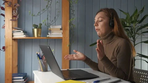 Side view, young woman discuss common project with colleague by video conference Video stock 144672753