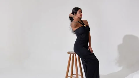 Side View of Young Woman Using Smartphone Against White Background Vídeos de archivo 333591331