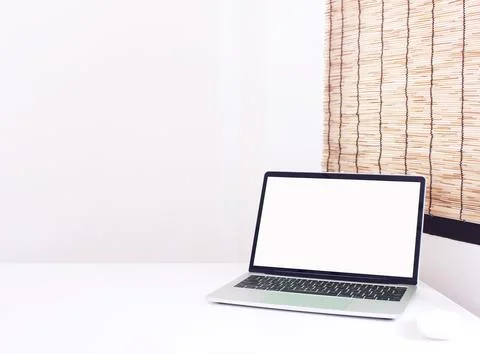 Side view,office table desk. Workspace with notebook and mouse on copy space Stock Photos
