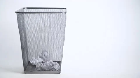 Side view,Throw crumpled into rubbish bin. Video stock 174289558