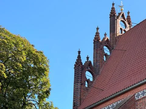 Side wall and gothic spires of historic church Stock Photos