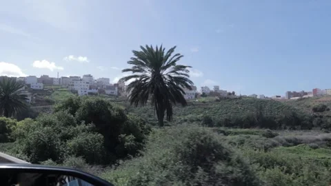 Side Window View Driving Past Green Hills And Village Sidi Ifni Morocco Stock Footage 332774707