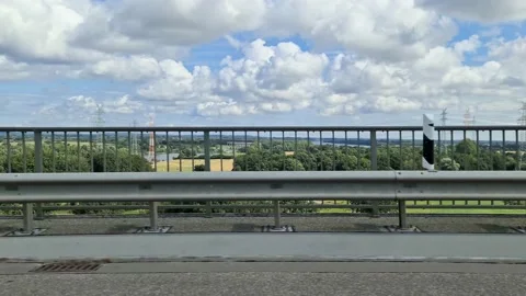 Side window view out of a driving car from the north baltic canal bridge at t Stock Footage 158678279