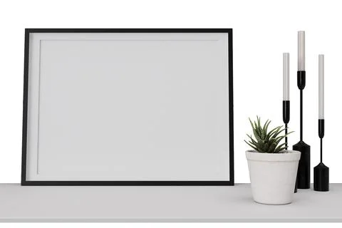 A sideboard shows a picture frame without a picture, next to a potted plant a Stock Photos