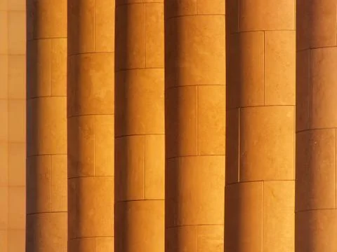 A sidelit colonnade as background Stock Photos